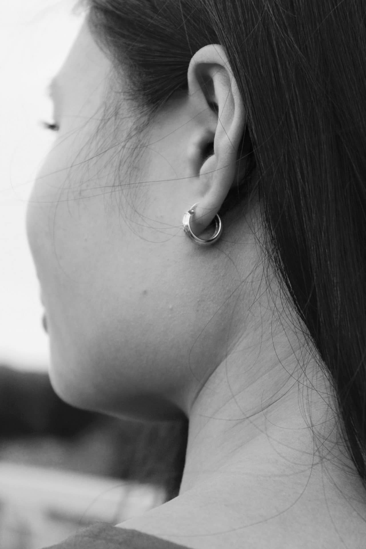 A close-up of a woman's ear.