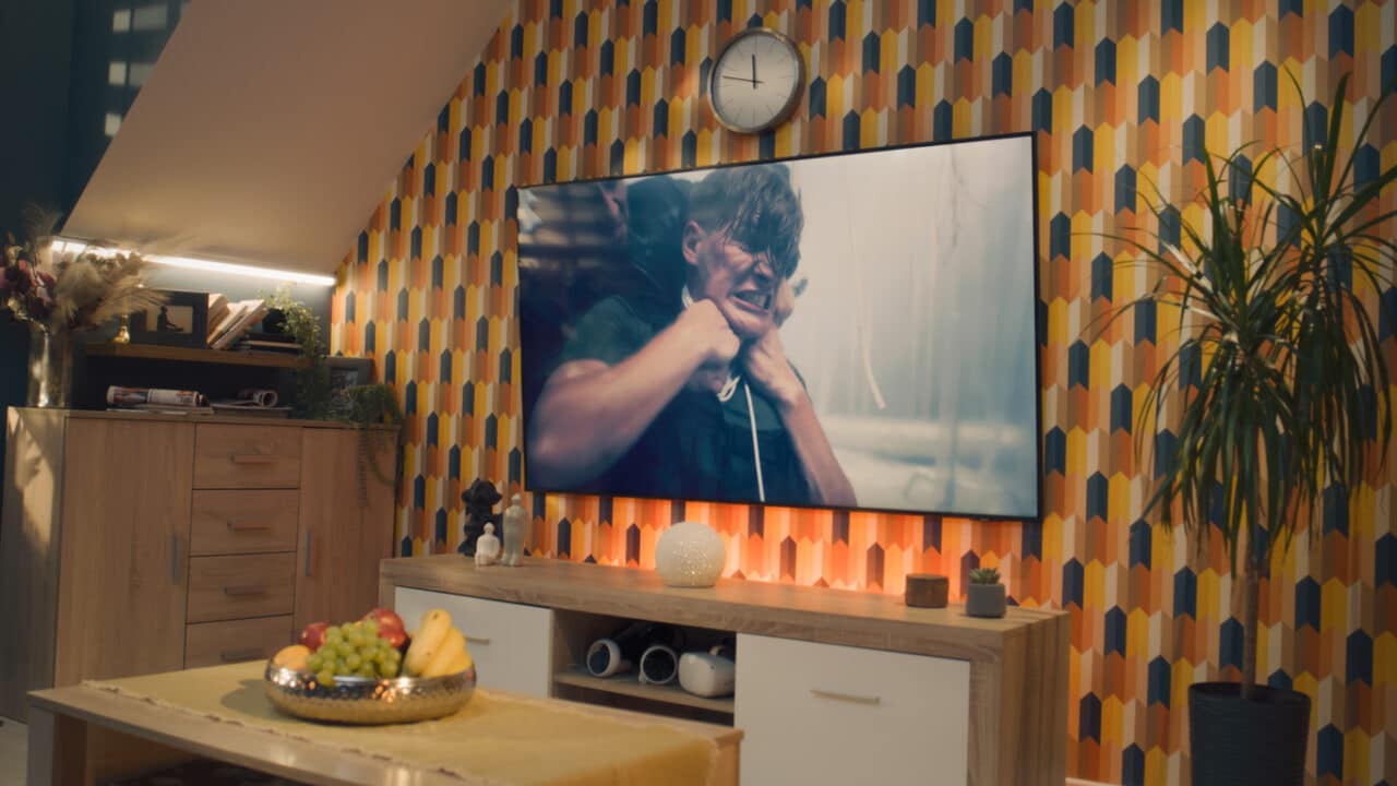 Close up of an action movie on a tv