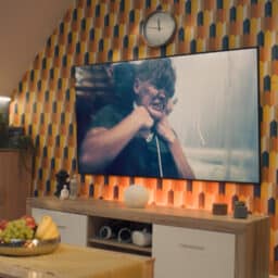 Close up of an action movie on TV