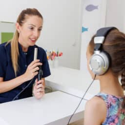 Child taking a hearing test