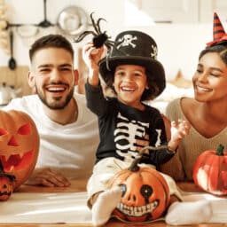Happy family with halloween decorations