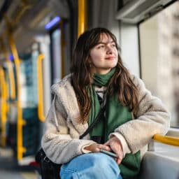 Smile Gen Z girl on the subway.